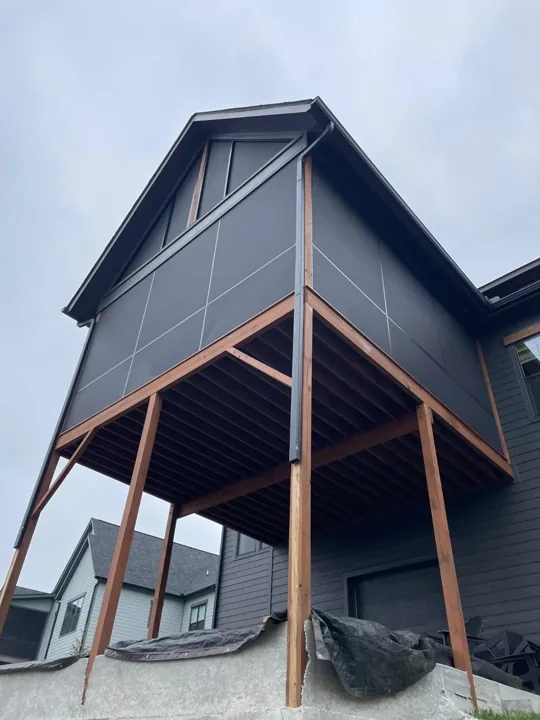 Screen enclosure on an elevated porch