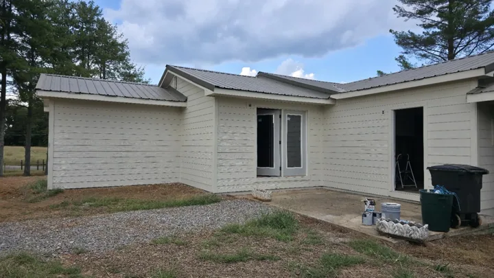 Patio-side siding installation in progress