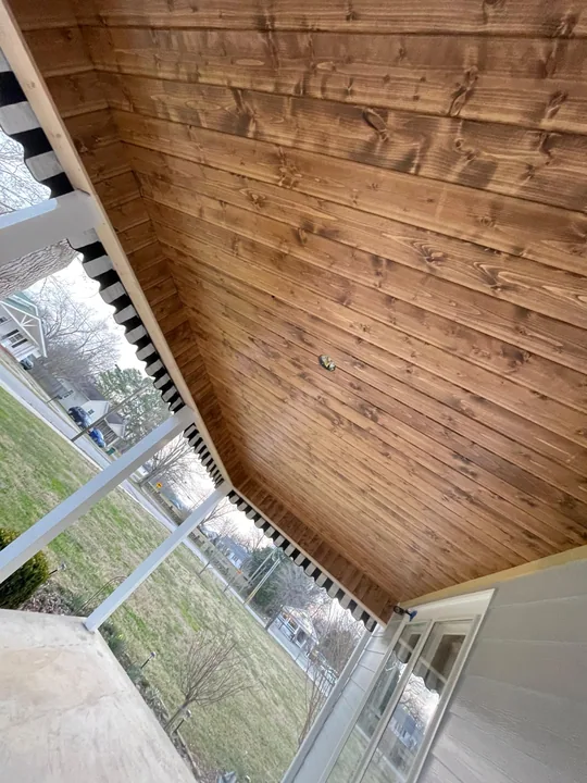 Stained tongue and groove porch ceiling
