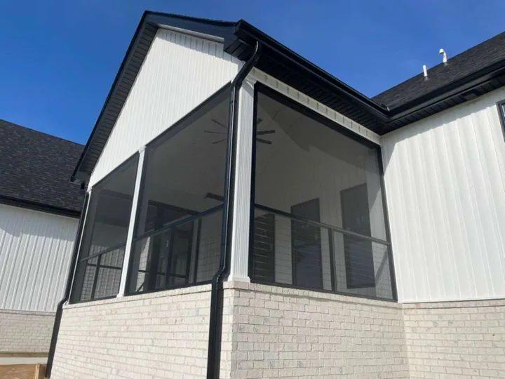 Tall screen panels enclosing a vaulted porch