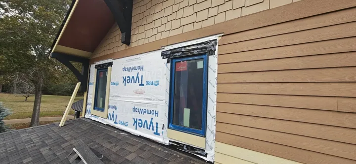 Preparing the wall around windows for new siding